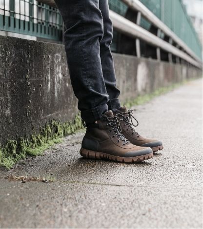 Shop the Men's Arcata Urban Leather Mid waterproof leather rain boots. The featured product is the Men's Arcata Urban Leather Mid in Chocolate