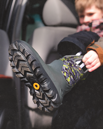 Shop Seamless Construction featuring a boy putting on the York Seamless.