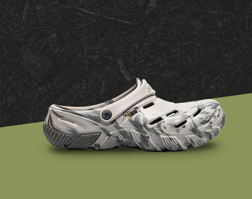 Image features the Boga slip on in taupe multi. 