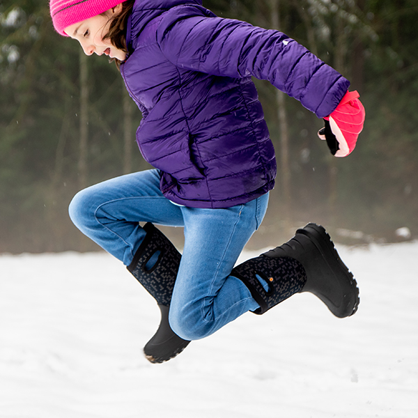 Shop the Kids' Neo-Classic insulated waterproof boots.  The featured product are the Kids' Neo-Classic Amazed in a digital black print.